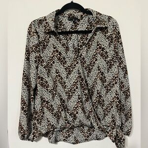 Gently used dressy casual animal print top
